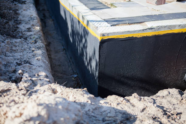 Professional Waterproofing technician working in Sayreville, NJ